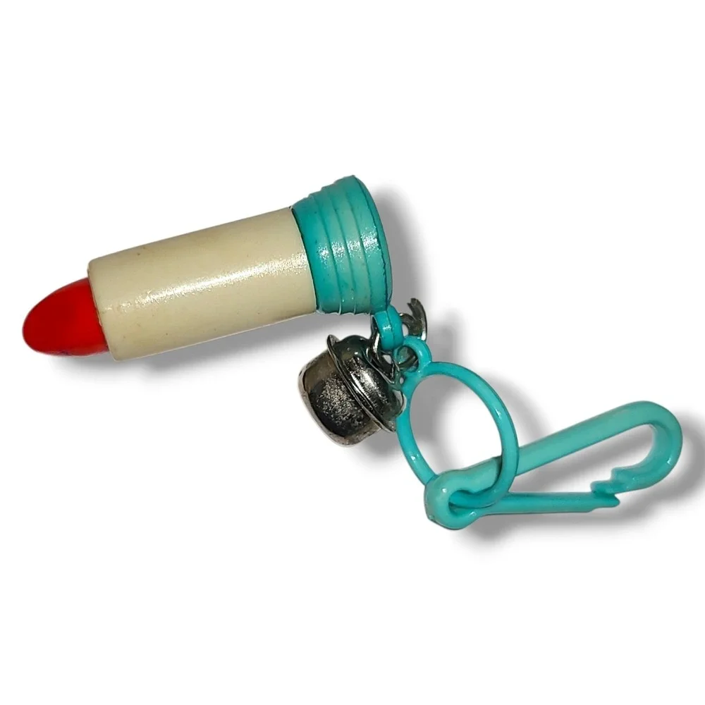 Vintage 1980s Plastic Bell Charm Clip-on Lipstick